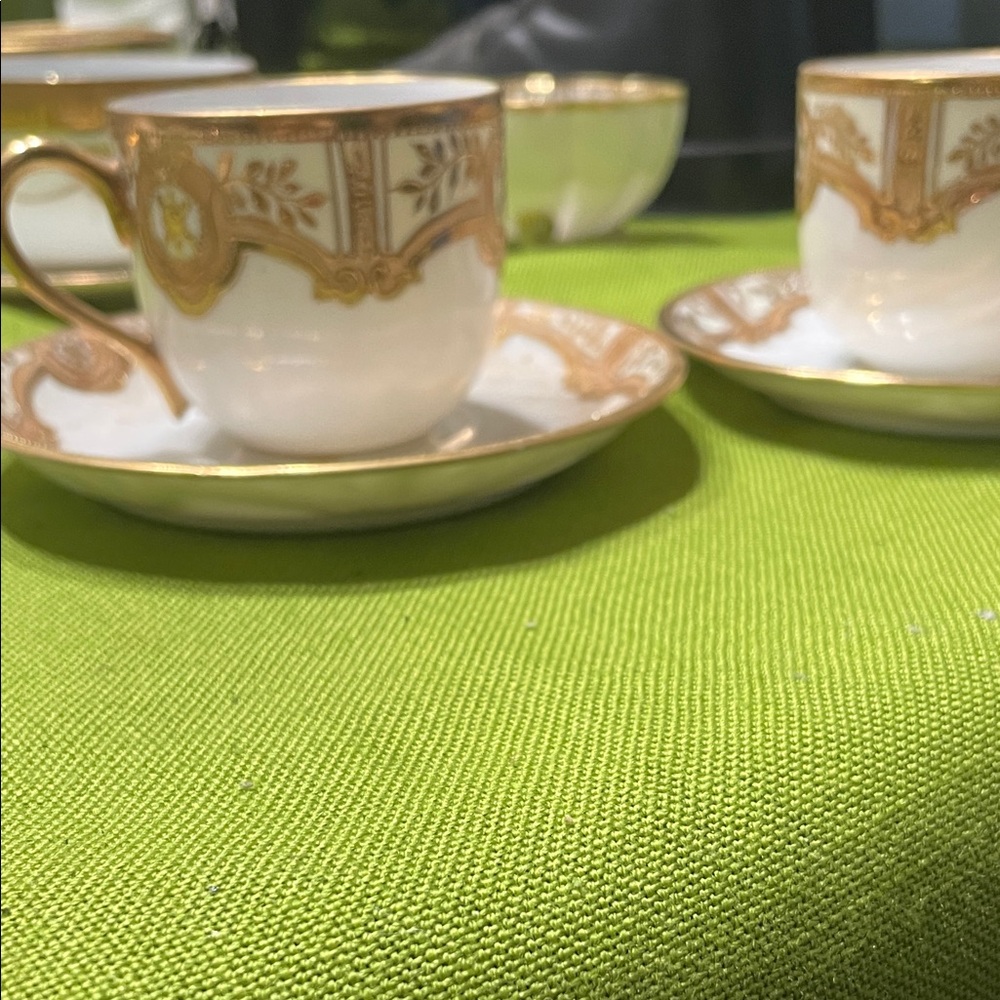 Nippon Two Elegant Gold and White Porcelain Tea Cup Set
